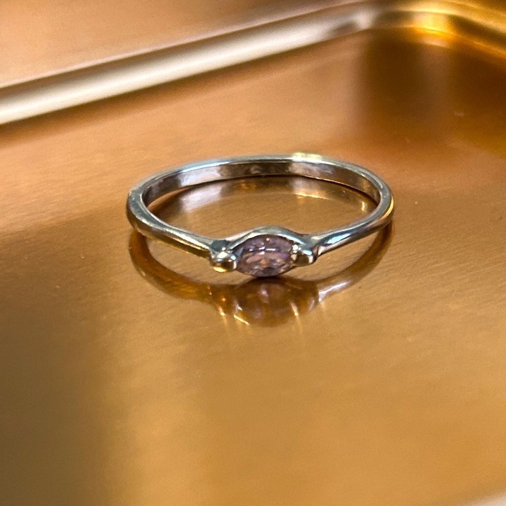 Simple silver ring with pale pink stone